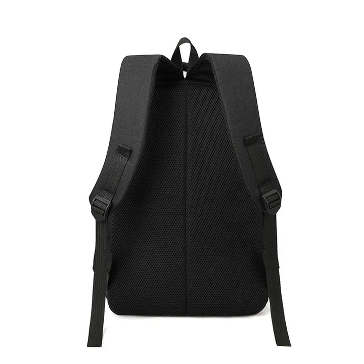Back view of black breathable mesh padded backpack with adjustable straps and top handle