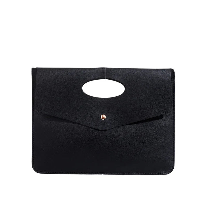 Minimalist black leather clutch bag with oval cutout handle and gold button closure