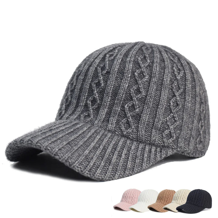 Gray knitted winter baseball cap with cable knit pattern and curved brim, available in multiple colors