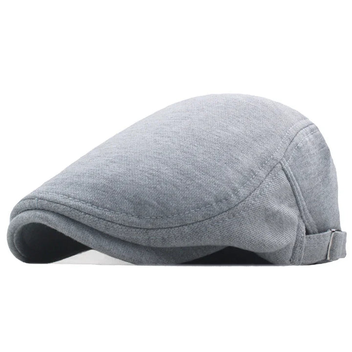 Gray flat cap hat with a smooth fabric texture and adjustable back strap