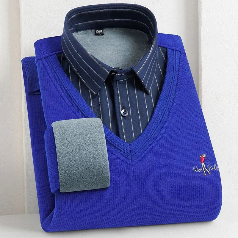 Folded blue V-neck sweater with navy pinstripe collared shirt underneath, embroidered logo on chest