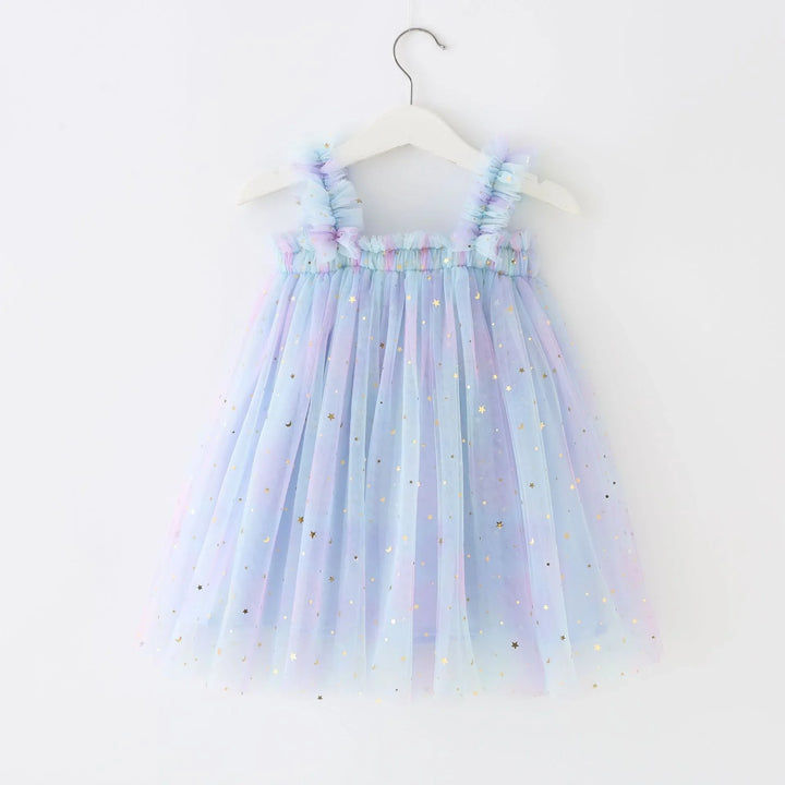 Pastel blue and pink tulle toddler dress with gold star and moon glitter, hanging on white hanger