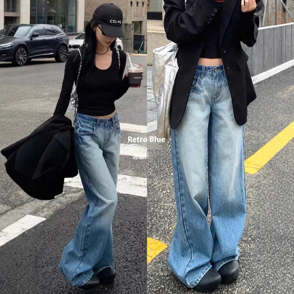 Woman wearing retro blue wide-leg jeans with black crop top and Celine cap walking on city street