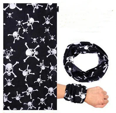 Black fabric with white skull and crossbones pattern, worn as wristband and neck gaiter