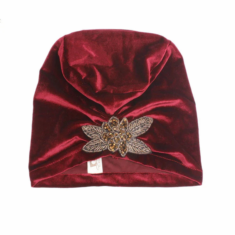 Burgundy velvet turban hat with decorative amber and gold beaded floral applique
