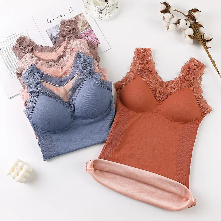 Soft lace trim thermal camisoles in rust, dusty pink, and blue, cozy casual wear flat lay