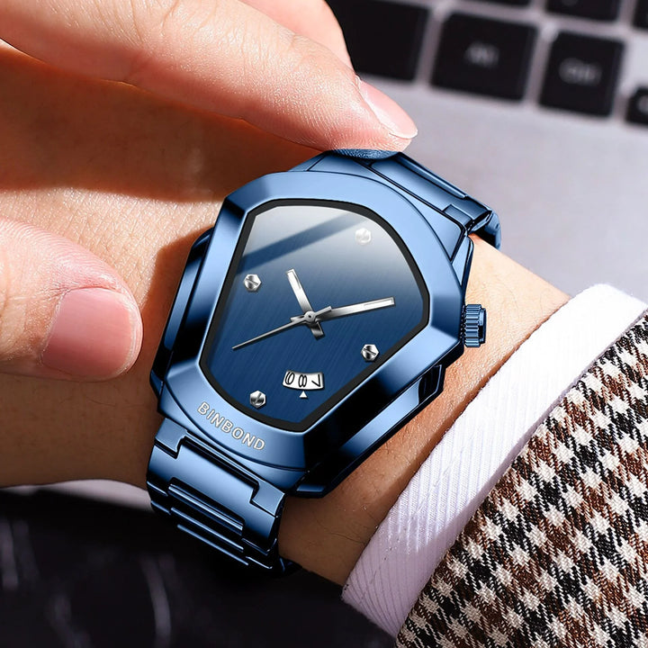 Blue BINBOND wristwatch with unique angular dial and metal band worn on wrist