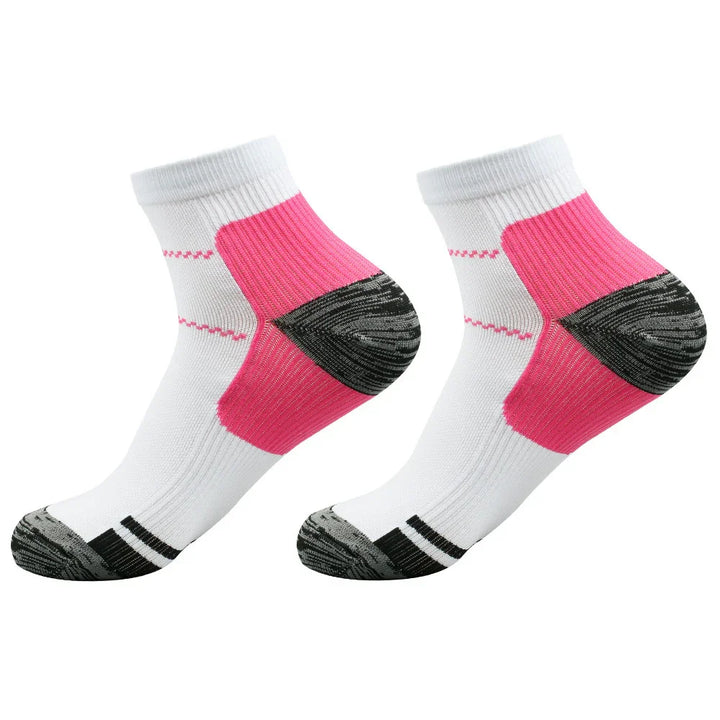 Pair of white ankle socks with pink heel support and black toe and sole accents