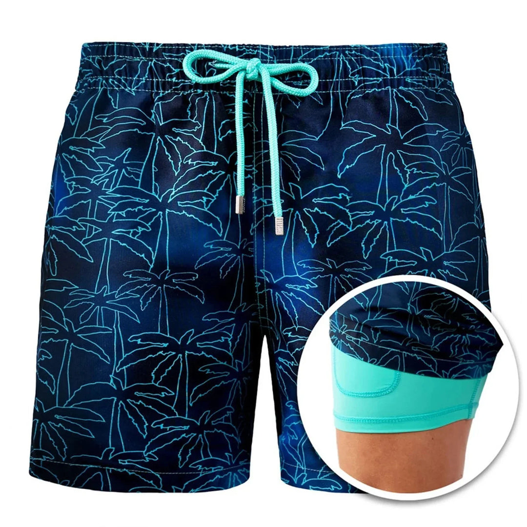 Men's navy beach shorts with blue palm tree print and turquoise inner compression lining