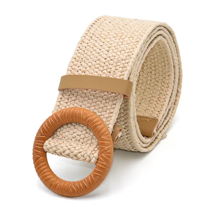 Beige woven fabric belt with round tan leather buckle and loop on white background