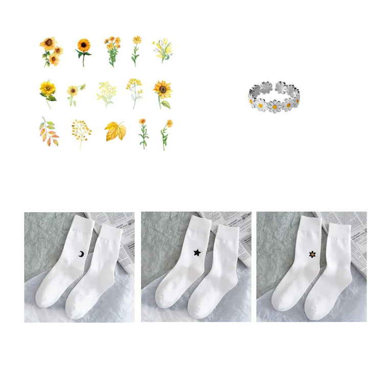 Set of yellow floral illustrations, silver daisy ring, and white socks with moon, star, and flower designs