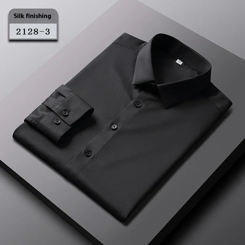 Black silk finishing dress shirt folded on dark surface with label 2128-3