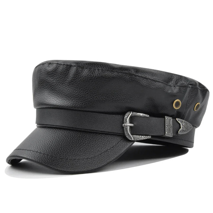 Black leather cap with textured silver buckle and ventilation eyelets