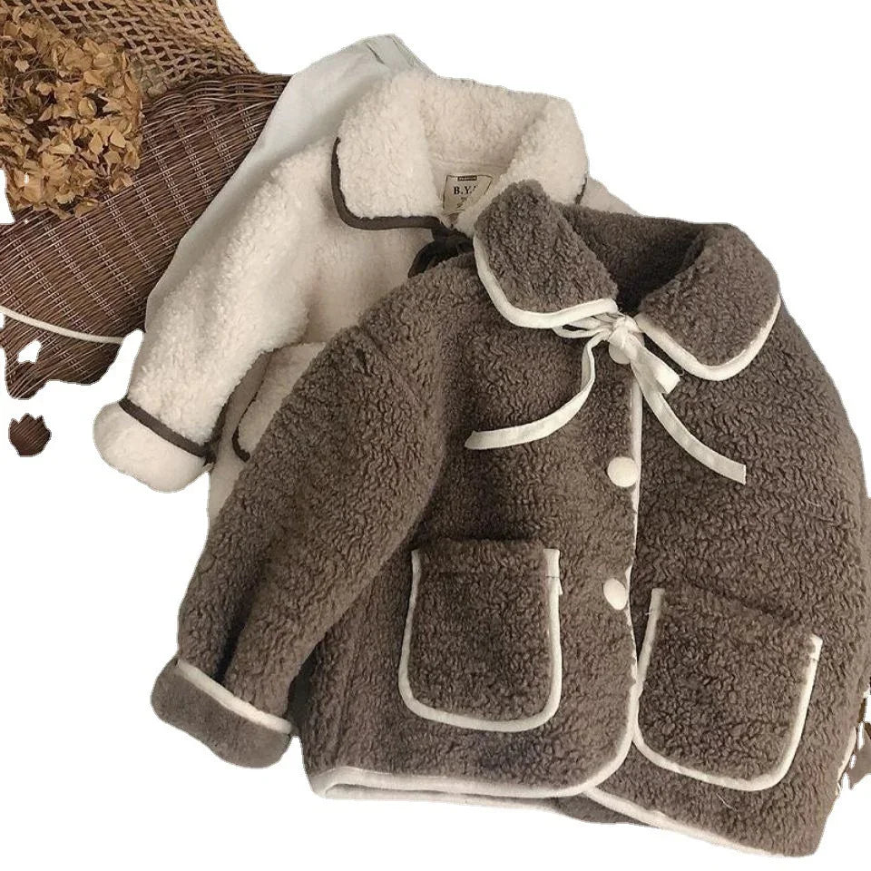 Two cozy sherpa fleece jackets in brown and cream with button front and pockets