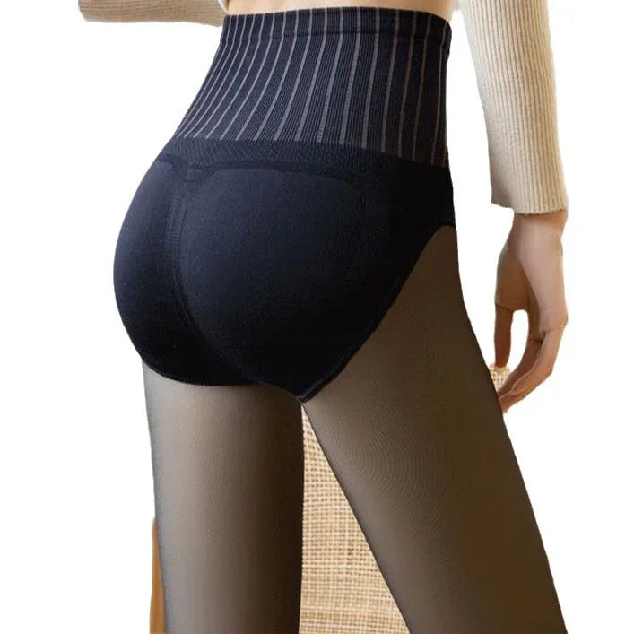 Rear view of person wearing high-waisted black shapewear shorts with sheer black tights and beige ribbed sleeve top