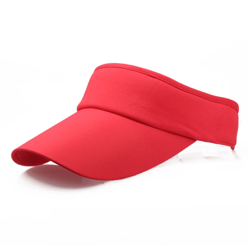 Bright red sports sun visor cap isolated on white background