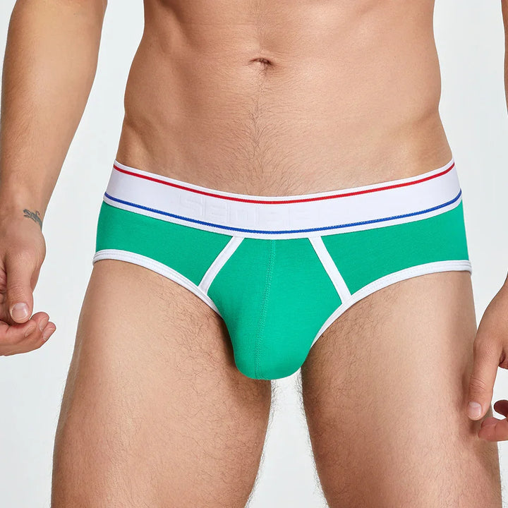 Men's green briefs with white waistband featuring red and blue stripes, worn by male model