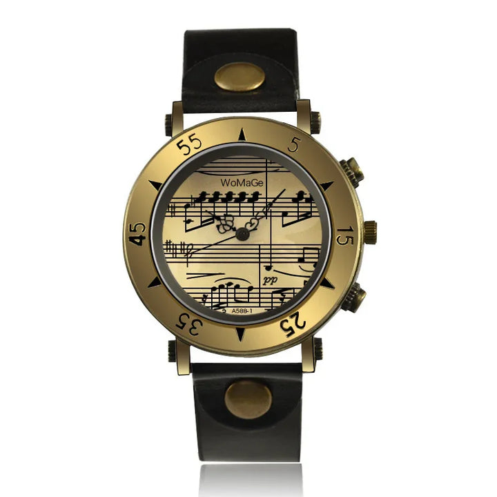 Gold-tone wristwatch with black leather strap and music notes dial design by WoMaGe