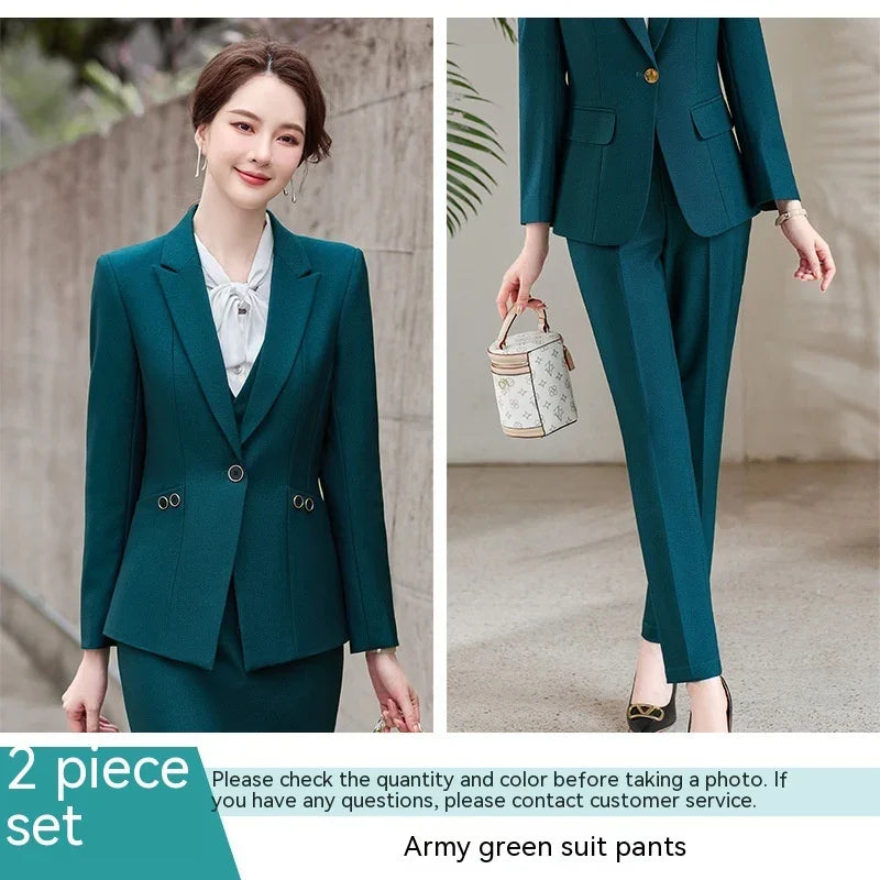 Woman wearing a stylish army green two-piece business suit with jacket and pants, paired with black heels