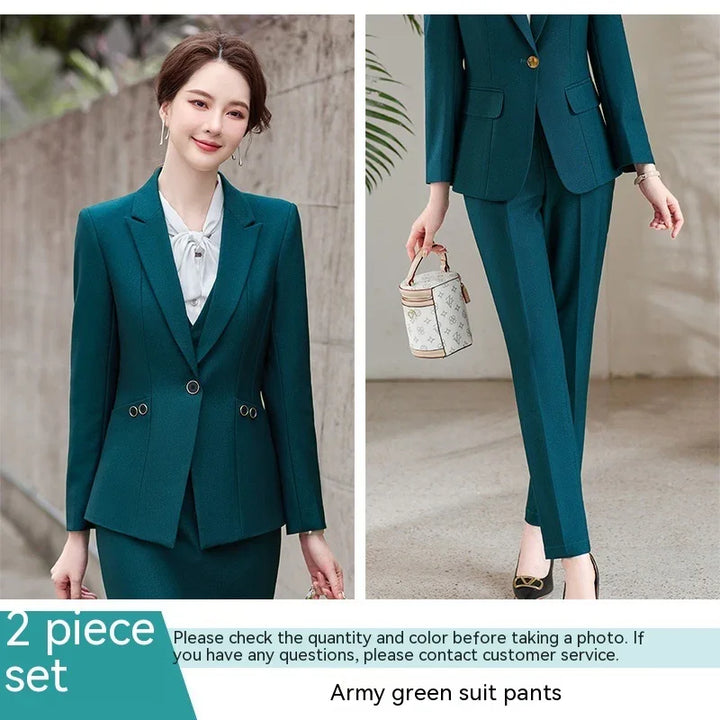 Woman wearing a stylish army green two-piece business suit with jacket and pants, paired with black heels