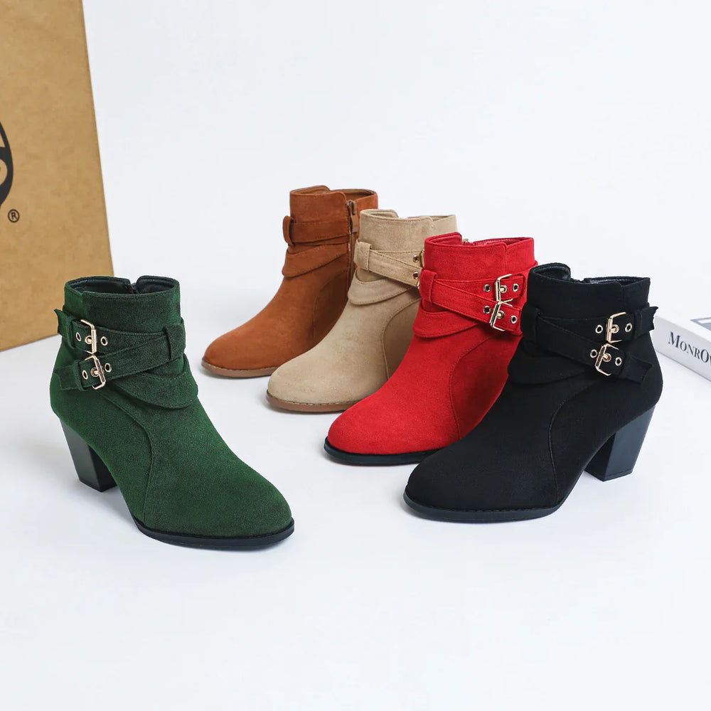 Collection of stylish women's ankle boots in green, brown, beige, red, and black suede with buckled straps
