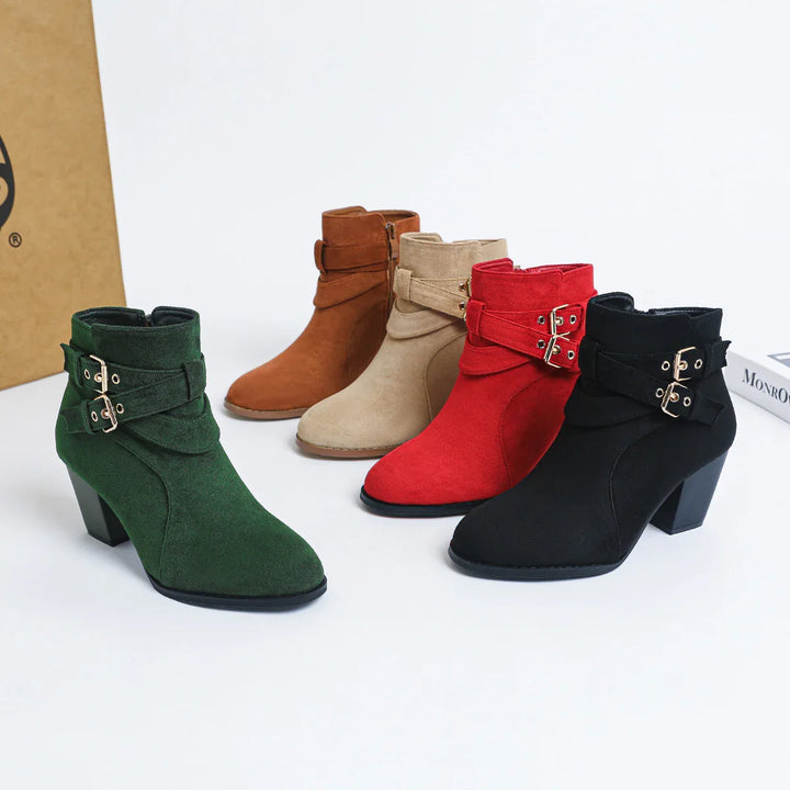 Collection of stylish women's ankle boots in green, brown, beige, red, and black suede with buckled straps