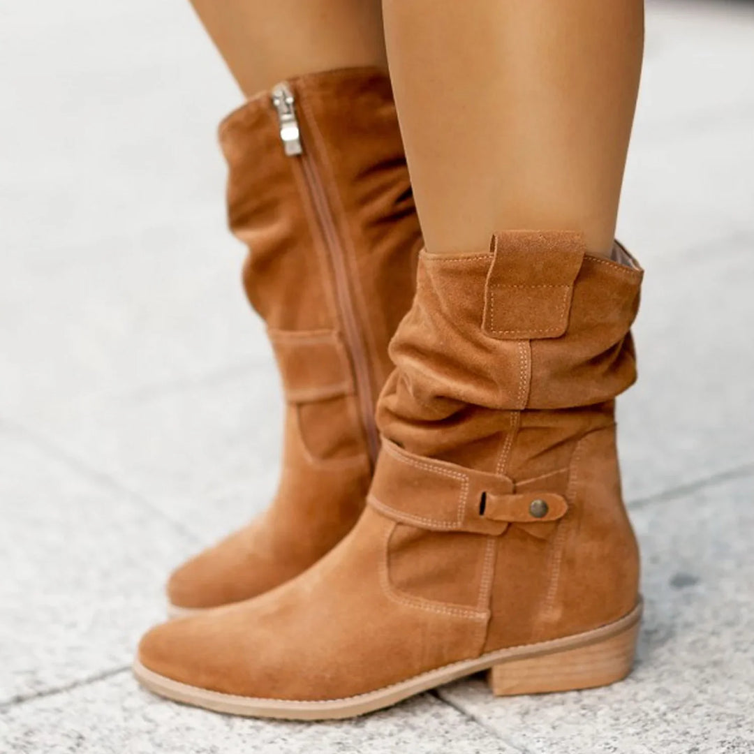 Women's tan suede mid-calf slouch boots with side zipper and low wooden heel