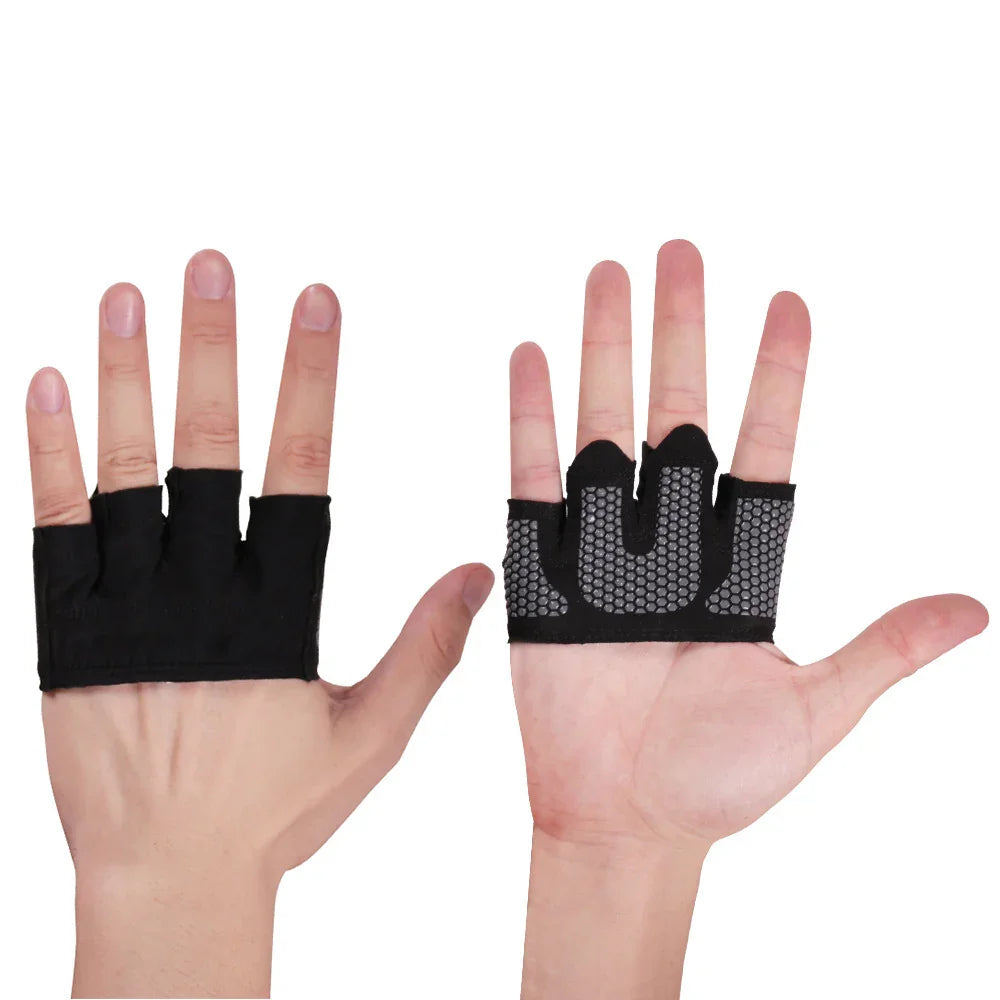 Hands wearing black half finger grip gloves with padded palms for workout or weightlifting
