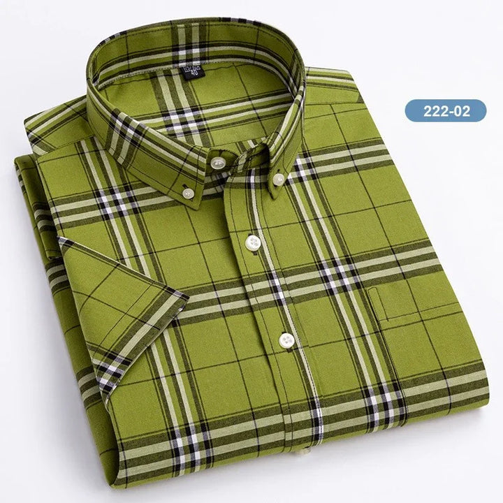Folded green plaid button-down shirt with short sleeves and white buttons