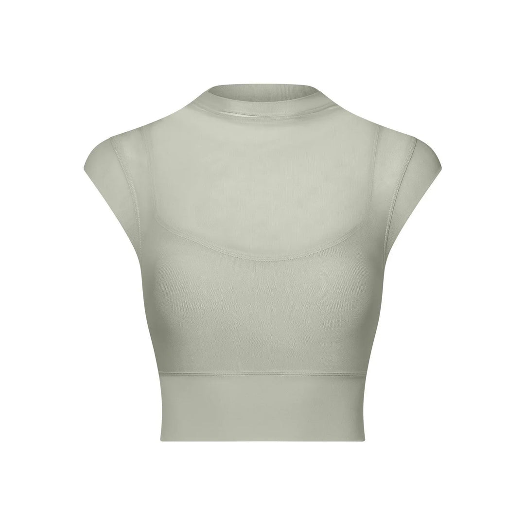 Beige mesh sleeveless crop top with high neckline and fitted design