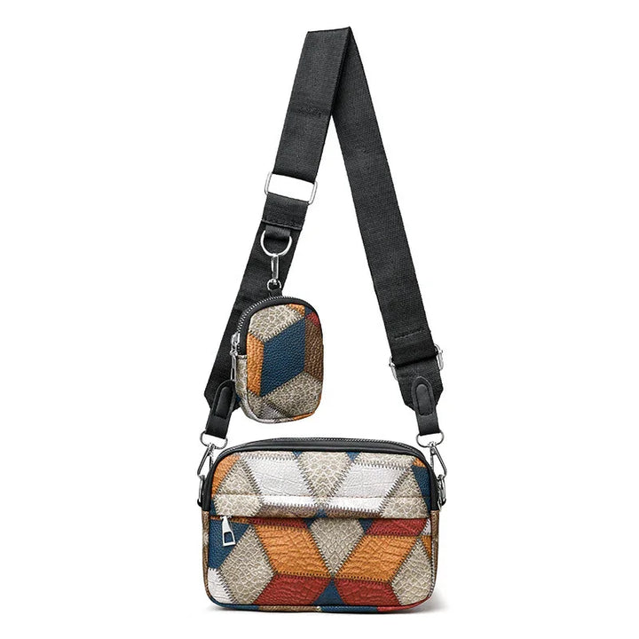 Colorful geometric patterned crossbody bag with adjustable black strap and small pouch