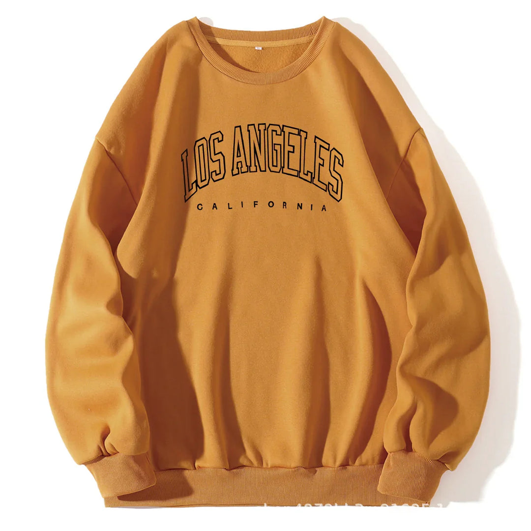 Mustard yellow sweatshirt with LOS ANGELES CALIFORNIA printed in black, casual cotton pullover