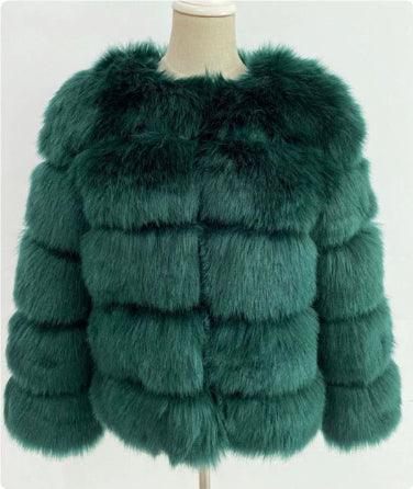 luxurious dark green faux fur jacket on mannequin, featuring horizontal plush panels and long sleeves