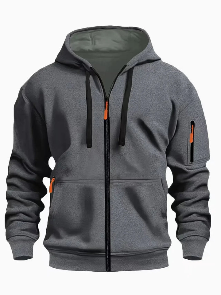 Grey fleece zip-up hoodie with black drawstrings and orange zipper pulls, featuring front and sleeve pockets