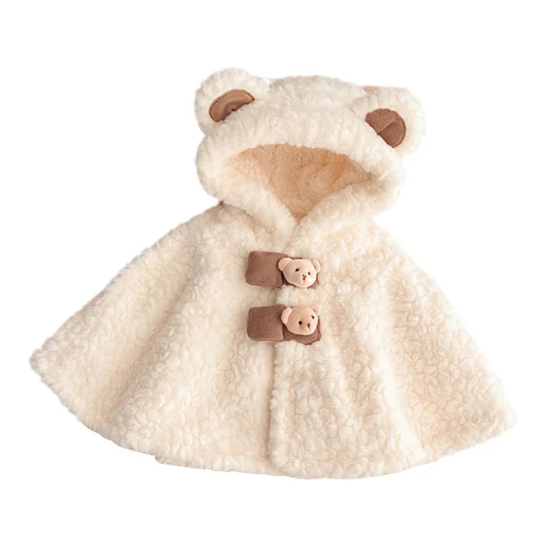 Cream-colored baby fleece cape with hood featuring bear ears and teddy bear button closures