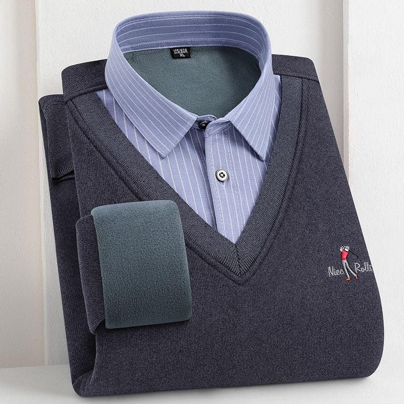 Folded men's navy blue V-neck sweater with embroidered golfer and light blue striped collared shirt