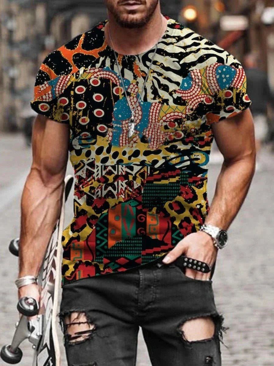 Man wearing colorful abstract patterned short-sleeve shirt with ripped black jeans holding skateboard urban style