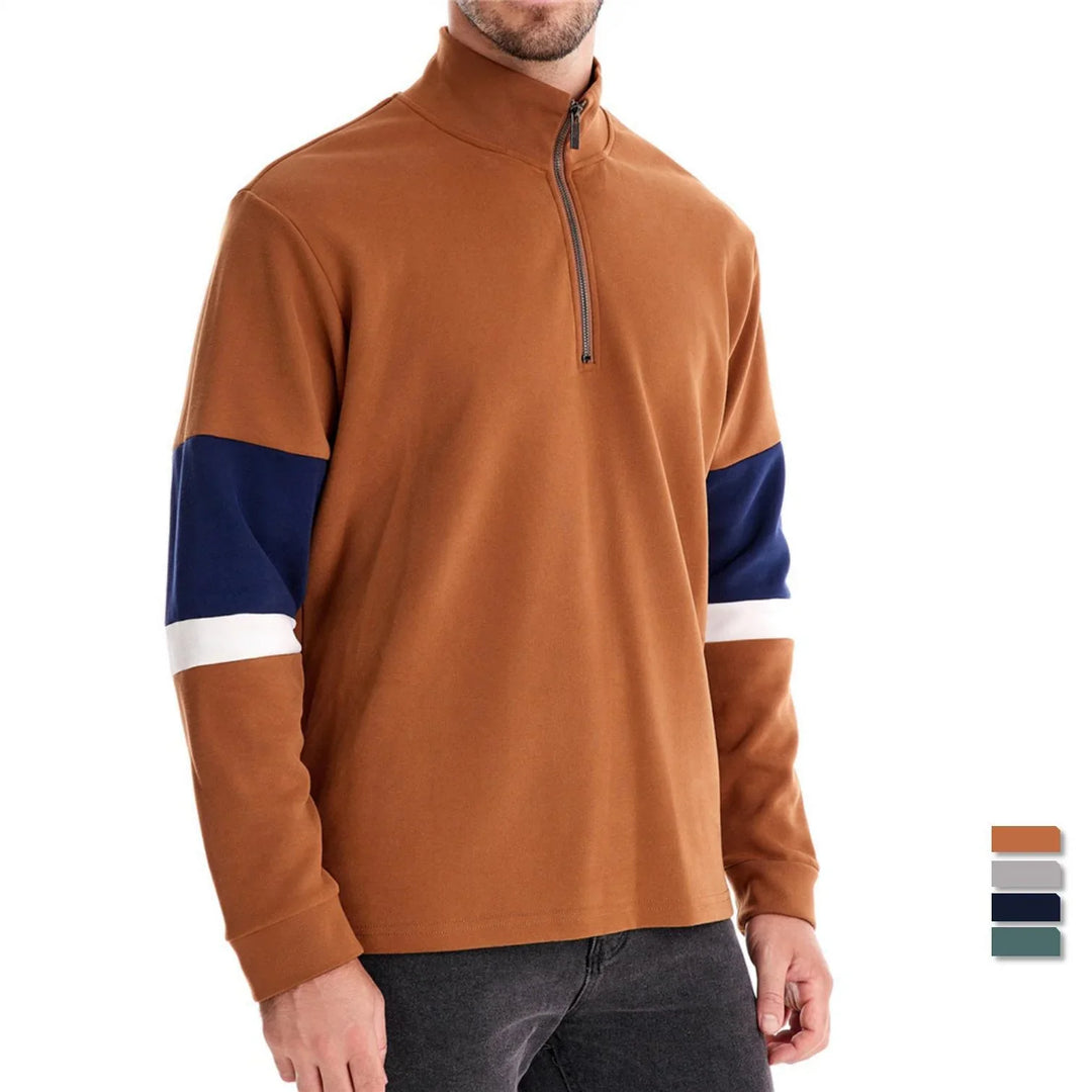 Men's brown quarter-zip sweatshirt with navy and white color block sleeves, casual wear