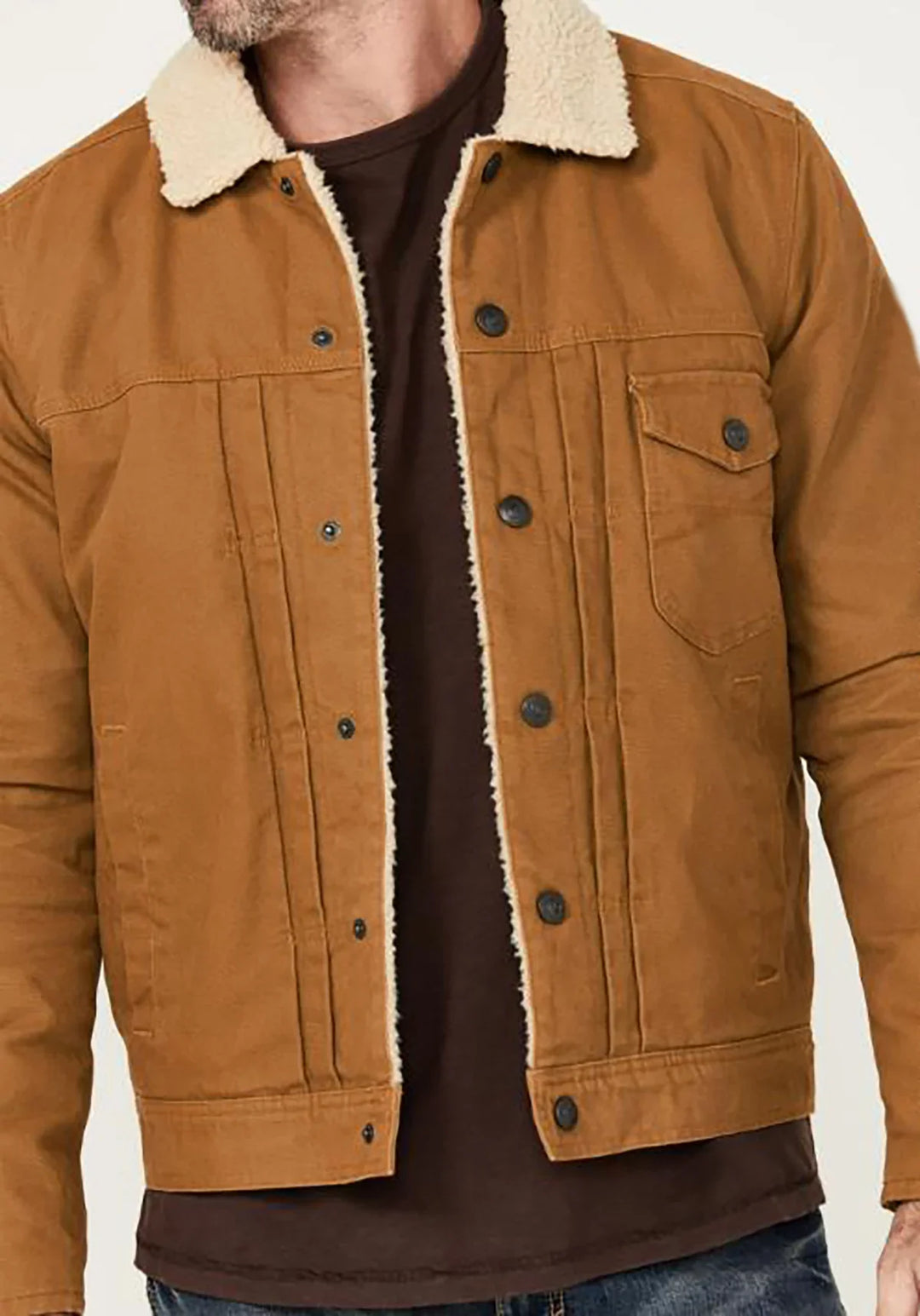 Men's brown sherpa-lined jacket with button front and chest pocket, worn over dark shirt
