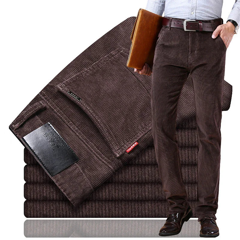 Brown corduroy pants stacked with close-up details and man wearing them holding brown leather folder