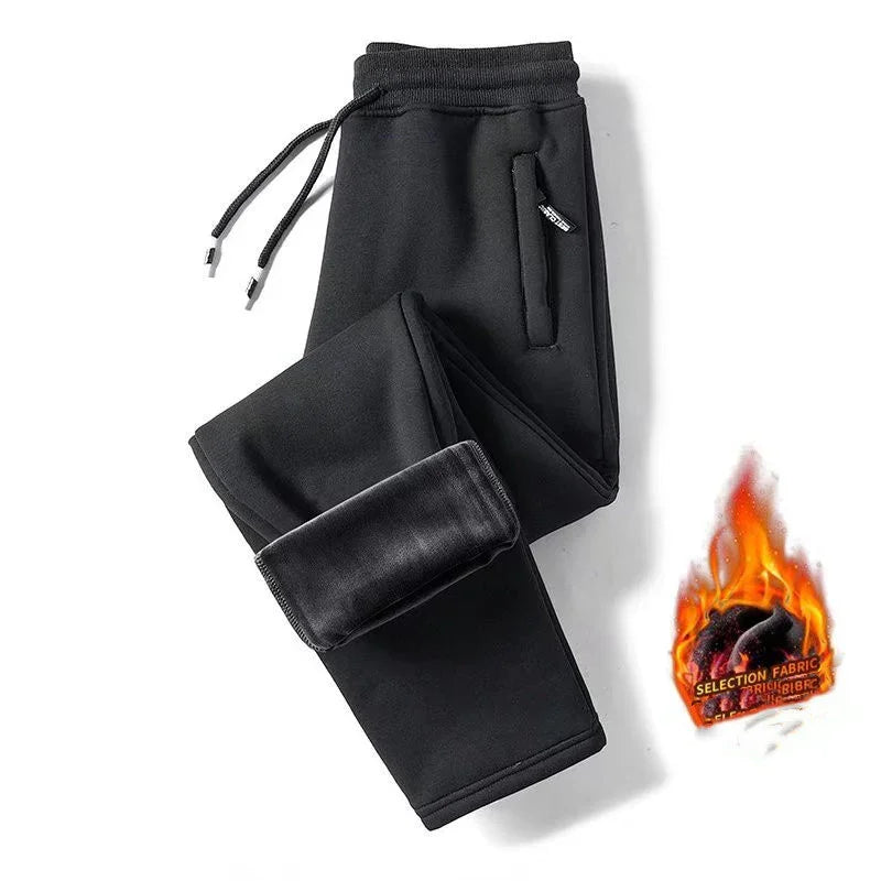 Black fleece-lined jogger pants with drawstring waist and side pockets on white background