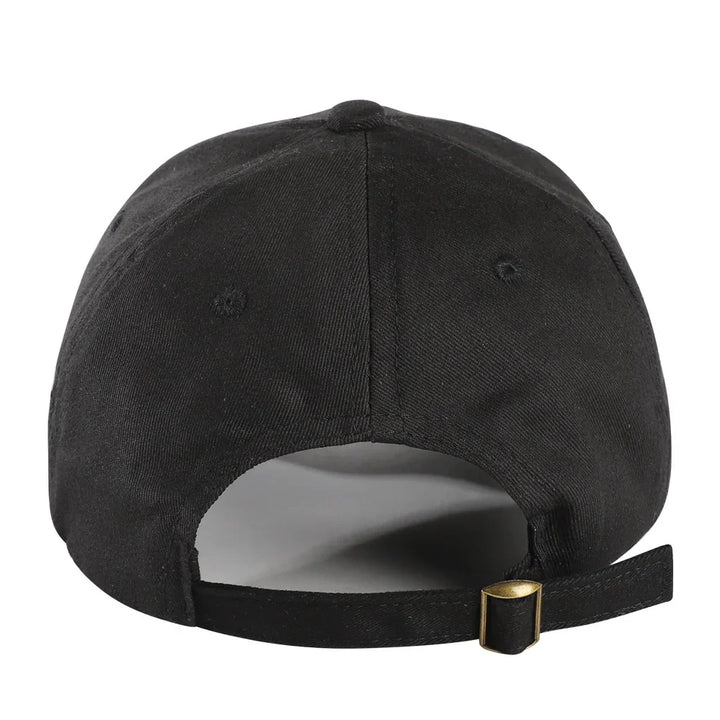Back view of black adjustable baseball cap with brass buckle strap on white background