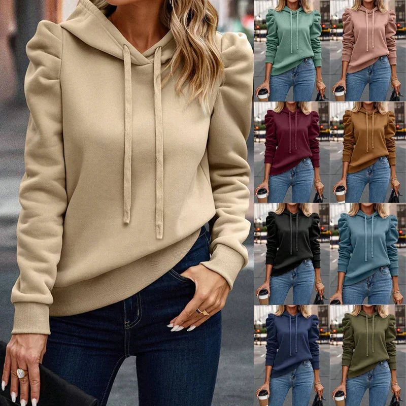 Women wearing puff sleeve hoodies in various colors paired with jeans, casual street style