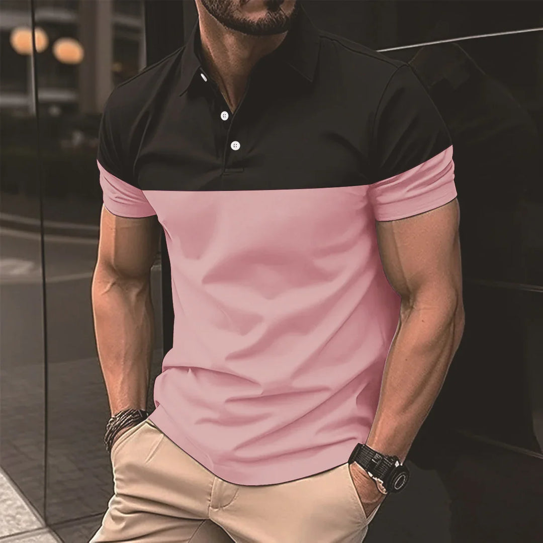 man wearing black and pink short sleeve polo shirt with beige pants and wristwatch