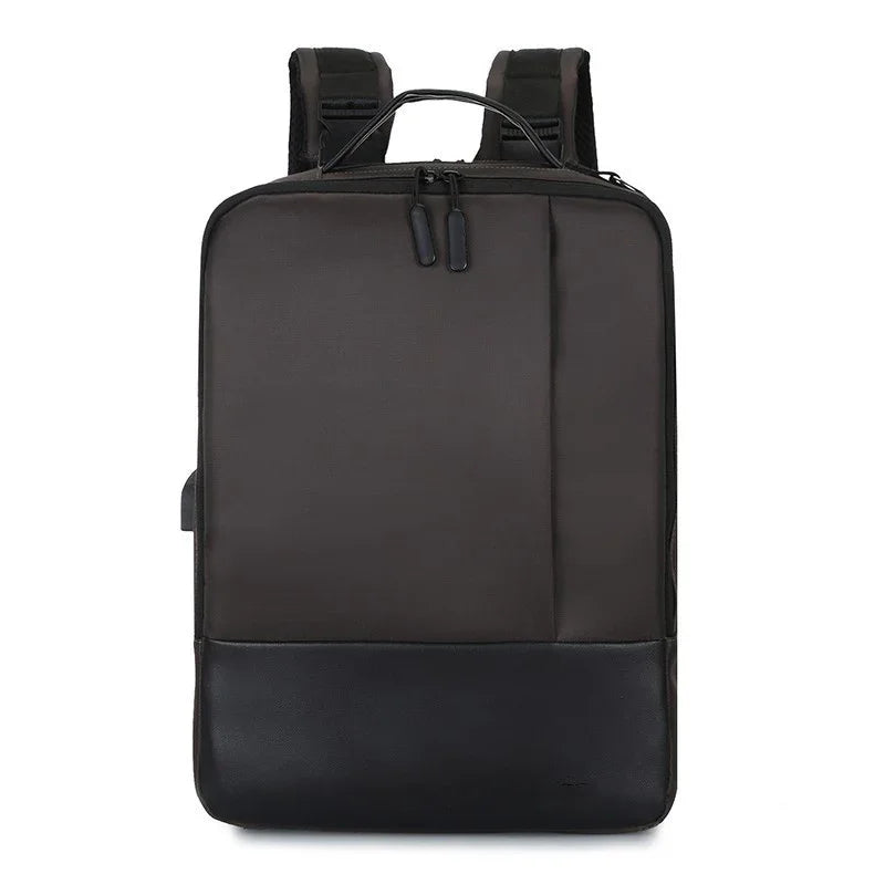 Sleek black rectangular backpack with padded straps and dual zipper closure on white background