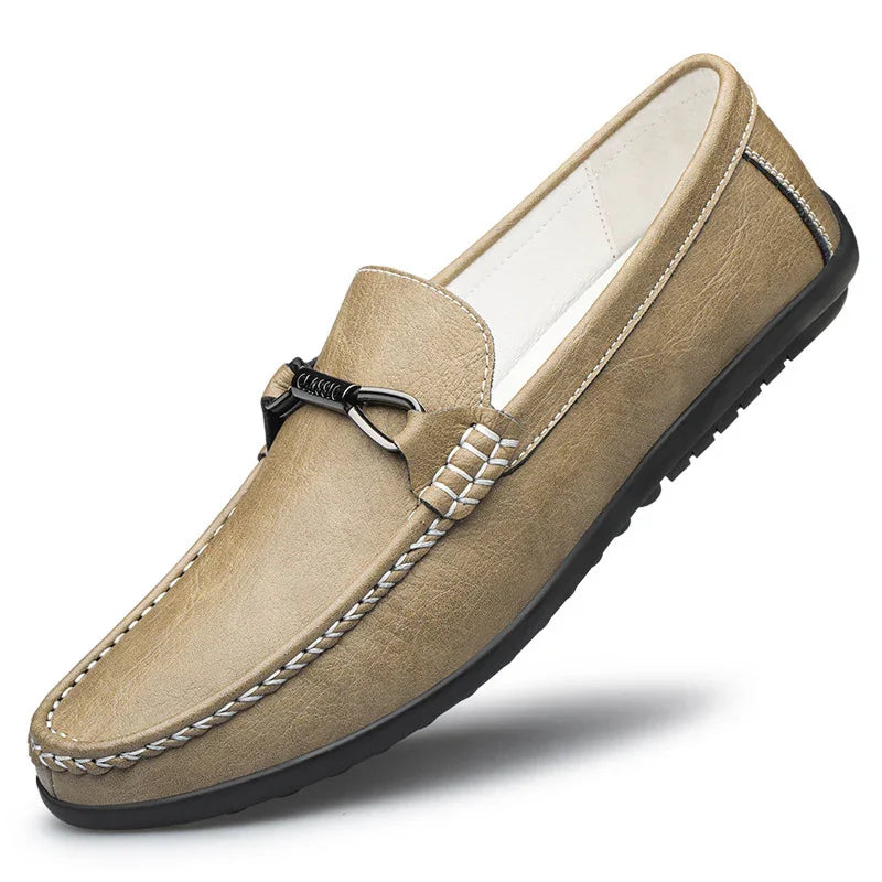 taupe casual men's moccasin loafer with black sole and metal bit detail