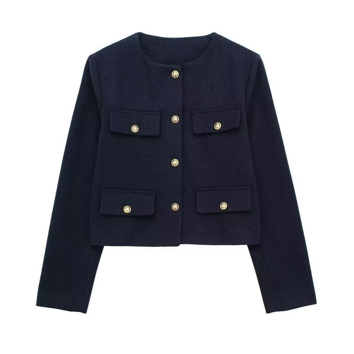 Navy blue cropped jacket with long sleeves and gold button details on front pockets