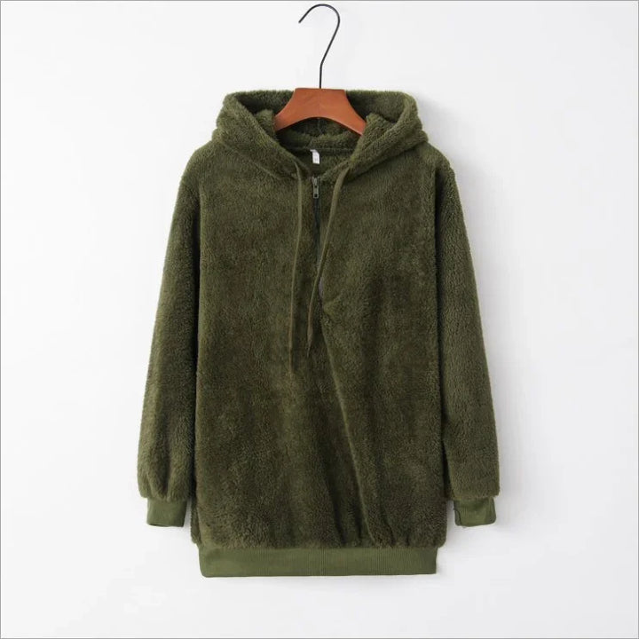 Olive green fuzzy fleece hoodie with half-zip and drawstring, hanging on wooden hanger