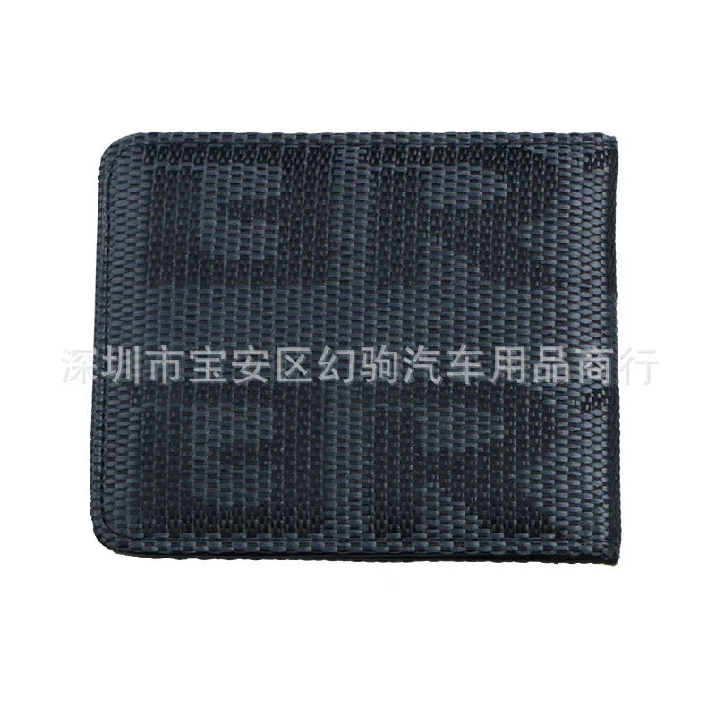 Black textured GMK keycap set wrist rest with woven fabric pattern