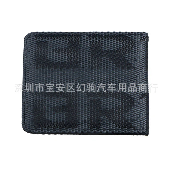 Black textured GMK keycap set wrist rest with woven fabric pattern